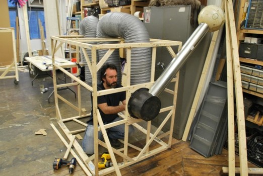 Jesse Bercowetz, a sculptor from Bushwick, Brooklyn, showed up at Occupy Halloween's Dumbo workspace for the first time Friday night and immediately began helping construct what will be a 20-foot-tall